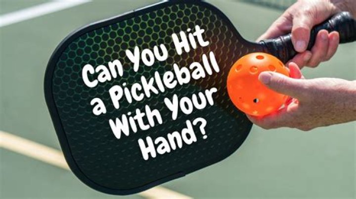 Can you hit the ball with your hand in pickleball