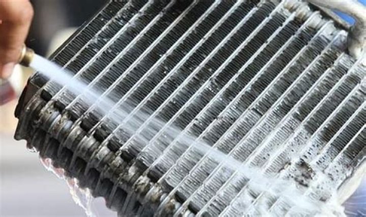 How do you clean an evaporator coil?
