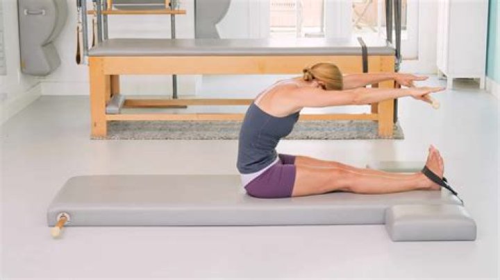 How do you do a Pilates roll up