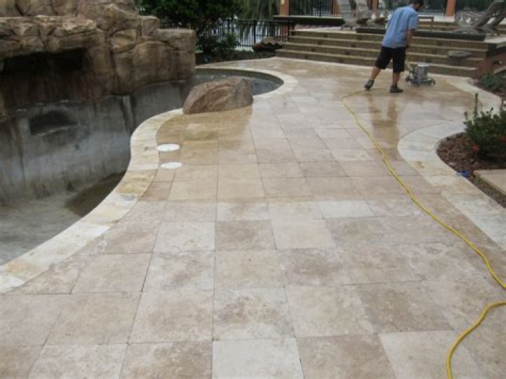 How do you lay travertine outside
