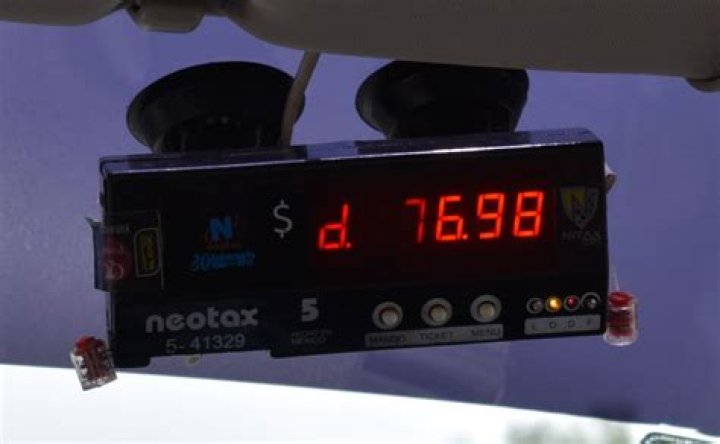 How do you reset a taxi meter?