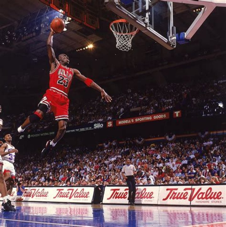 How does Michael Jordan manage to hang in the air for so long when he goes up for a slam dunk?