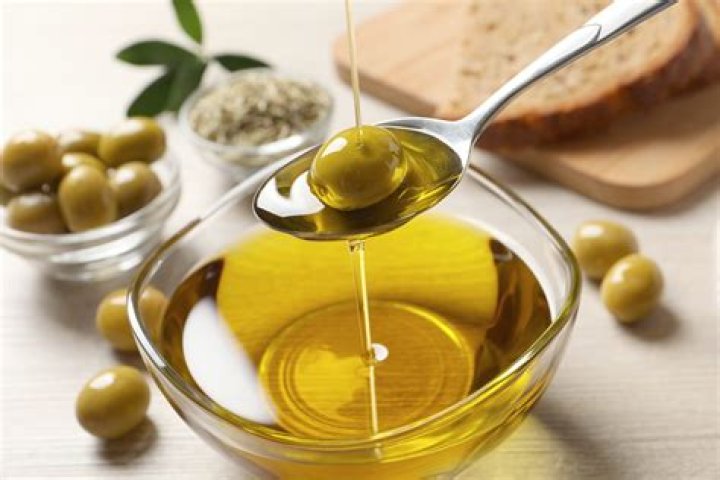 How many calories are in a tablespoon of virgin olive oil?