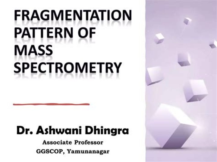 What causes fragmentation in mass spectrometry?