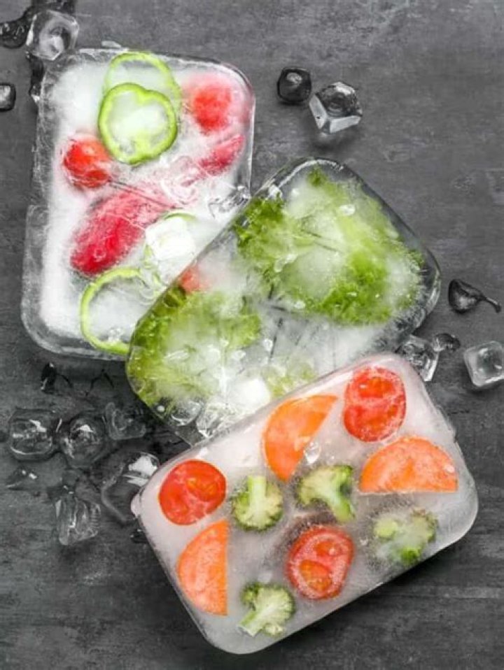 What causes ice crystals to form on frozen food