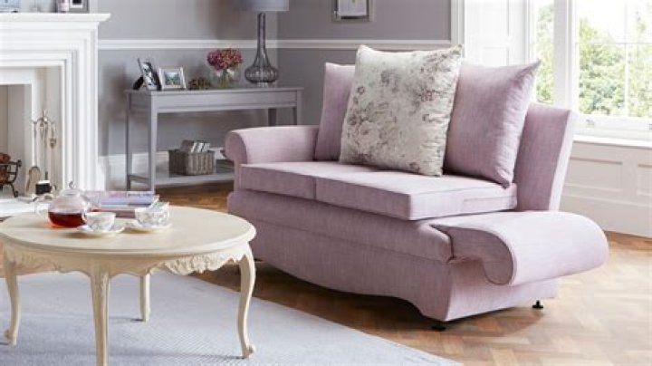 What is a drop arm sofa for?