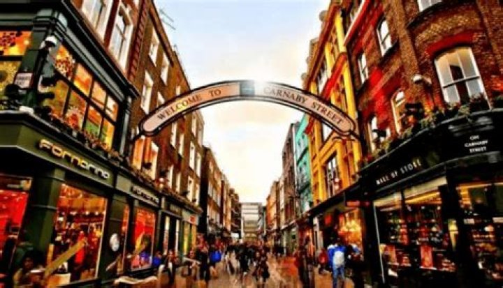 What is the main shopping street in SoHo?