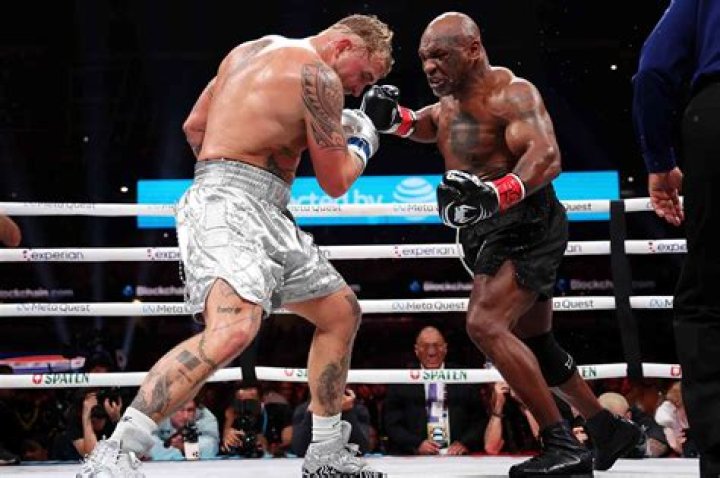 Who did Mike Tyson fight after losing to Buster Douglas?